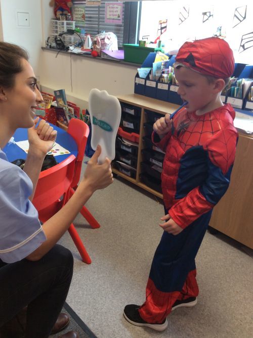 Spiderman cleaning his teeth