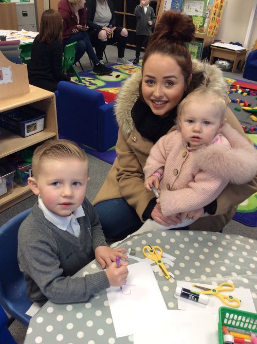 Corey with mum and younger sister